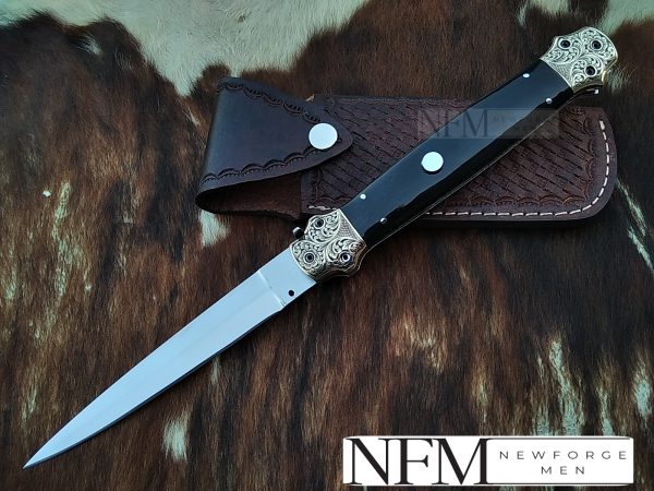 Buffalo Horn flick blade knife with brass bolsters